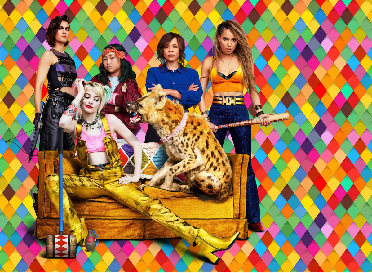 Promotional image for Birds of Prey featuring the cast in bright outfits (including a hyena) against a colorful background