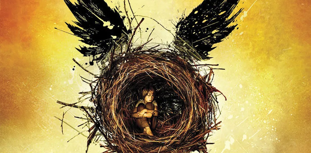 The Cursed Child poster featuring a boy curled up in a sort of...nest.