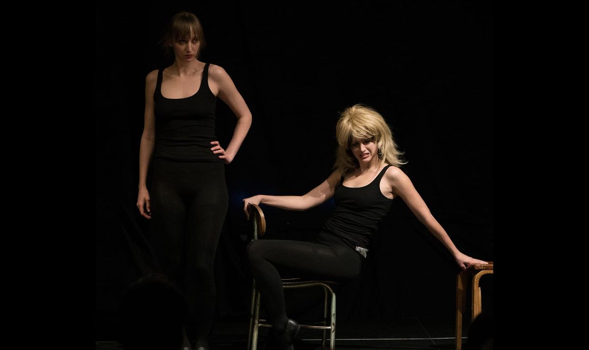 Emily Allan and Leah Hennessey on stage performing “Slash.” 