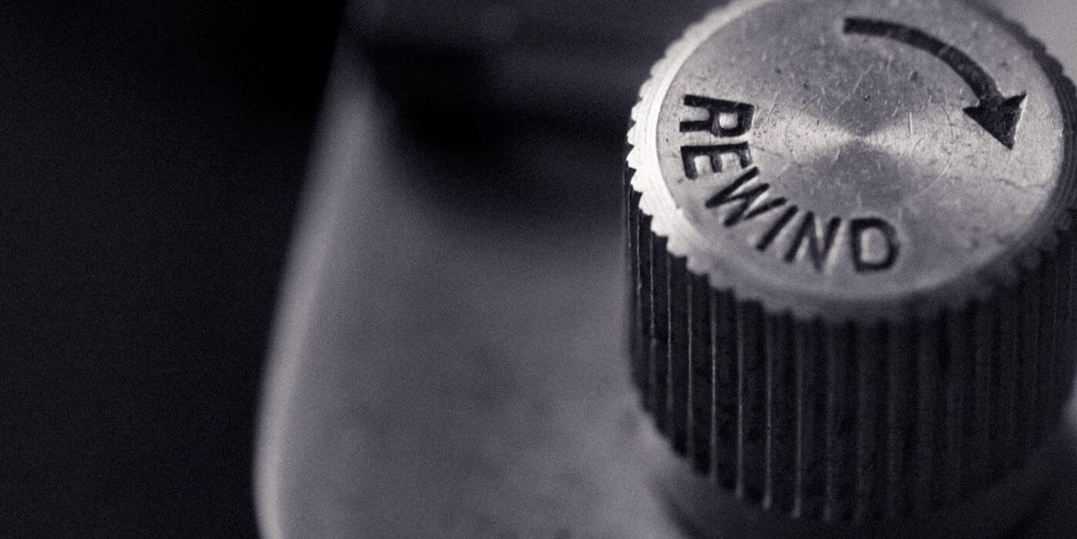 Black and white image of an old-fashioned rewind dial