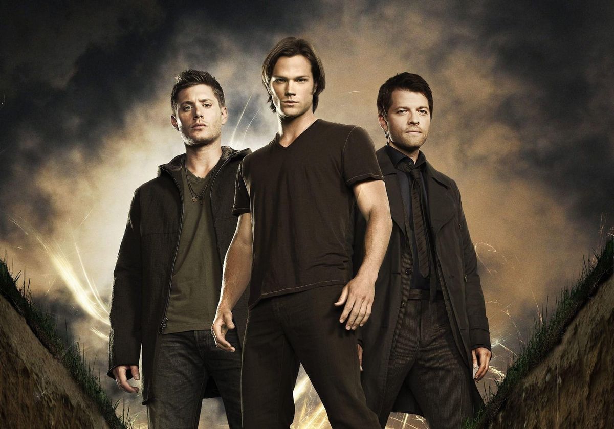 Promo image for SPN featuring Jensen, Jared, and Misha in dark clothing