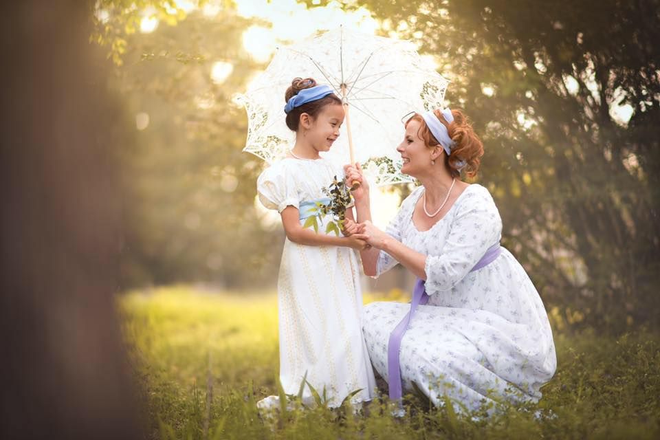 Teresa Nguyen and her daughter, dressed in Regency costume. 
