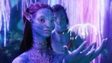 Image of Neytiri from Avatar in the foreground, Jake in the background, both cast in a purplish light.