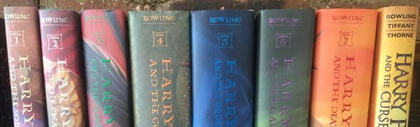 Harry Potter hardcovers in a row. The final book’s authors are listed as Rowling | Tiffany | Thorne.