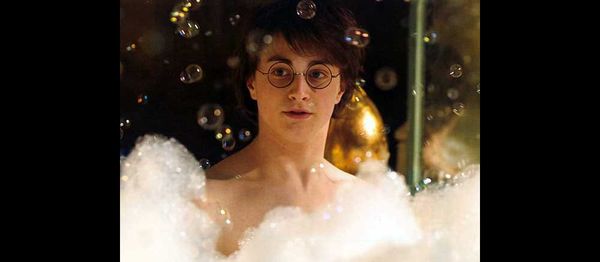 Harry Potter in the bath, golden egg in the background.