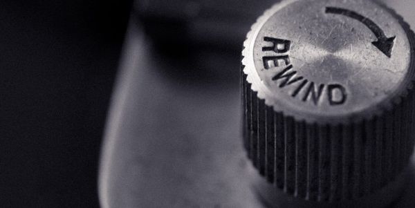 Black and white image of an old-fashioned rewind dial