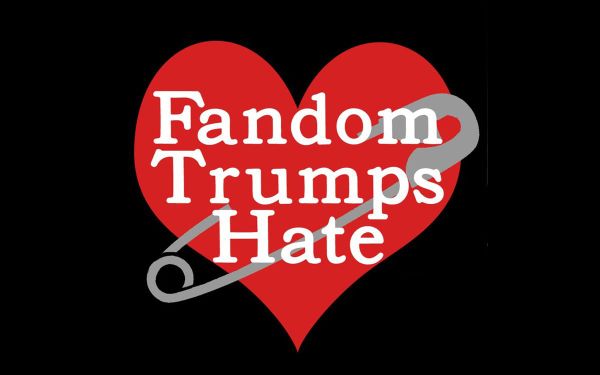 The Fandom Trumps Hate logo, a heart with a safety pin through it. 