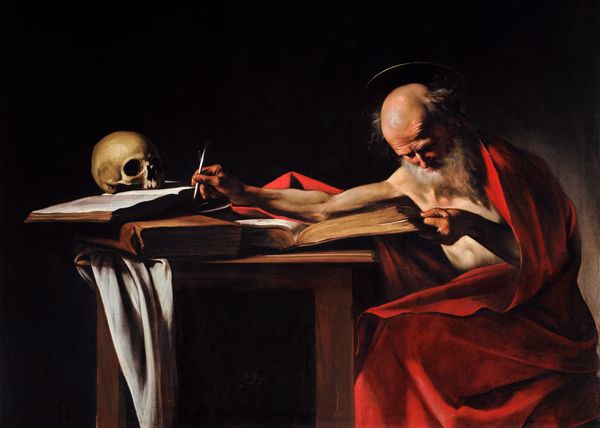 Caravaggio's paining "St Jerome Writing" featuring a bare-chested old man cloaked in red (with a faint halo), stretching out over a book (with a skull on top), writing. 