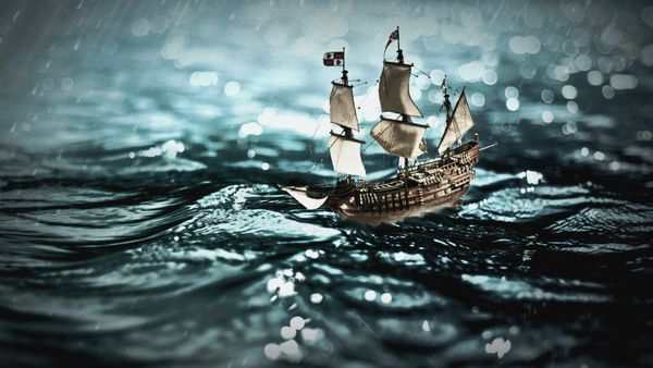 A model sailing ship on water