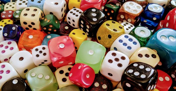 Photograph of many dice in various color