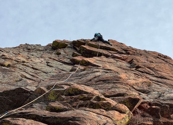 Climber on top of the wall