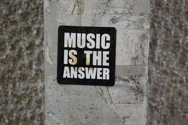 Music is the answer sign 