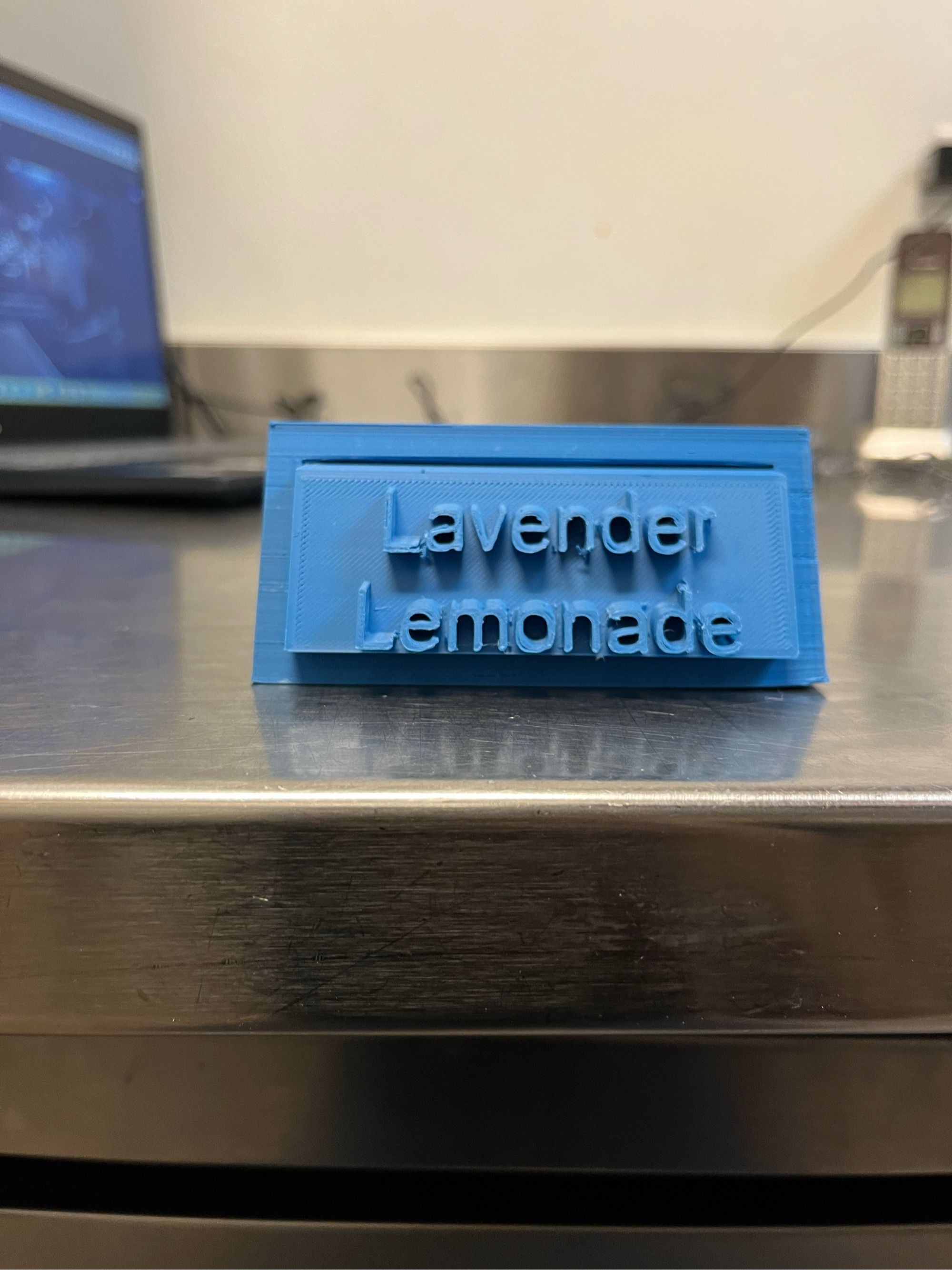 Front facing sign that reads Lavender Lemonade. 