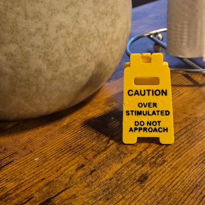 Desktop Caution Overstimulated Sign