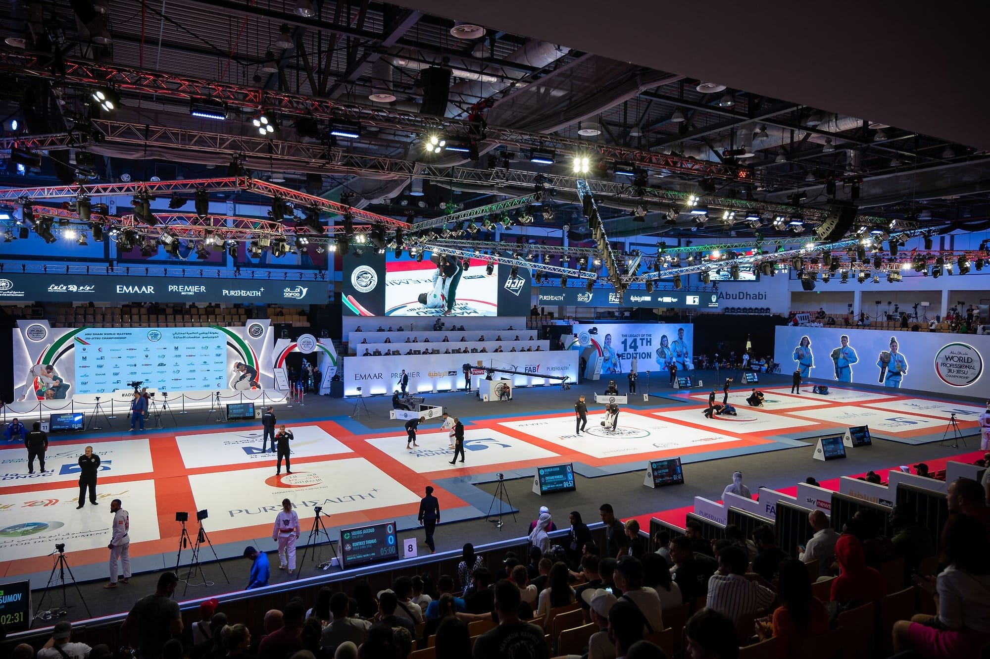 An archival view across the competition mats in Abu Dhabi.