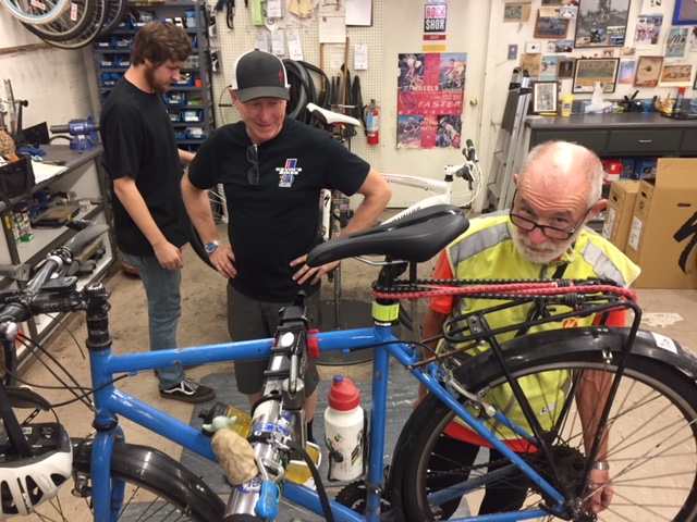  Francois Hennebert estimates he has put over forty-five thousand miles on his bicycle.  His current trip from Mexico to Canada will add another twenty-five hundred miles, and probably many more miles as he takes various detours to see the western United States.  He’s shown here with Kevin from Kevin’s Bikes. Photo: Steve Newvine 