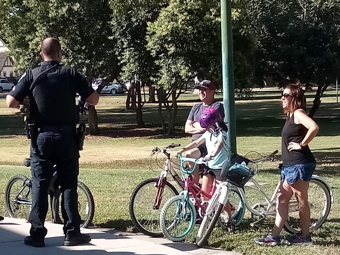  Bicyclists are welcomed to the Pedaling with the Police event sponsored by the Merced Police Department.  Photo:  Steve Newvine 