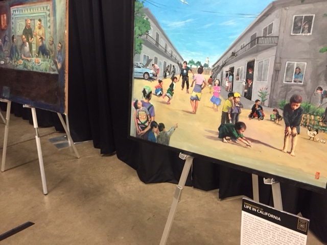   Paintings by Hmong artists depicting life in California.  Photo by Steve Newvine 