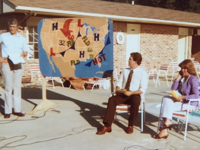  While live on-the-scene reports were common on local television stations in the early 1980s, moving the entire news anchor team on location was a relatively new trend.  Pictured are WAAY weather man Bob Baron, anchor Jim Marsh and the late Helen Howard in a newscast dedicated to summer recreation.  Photo from the Newvine Personal Collection. 