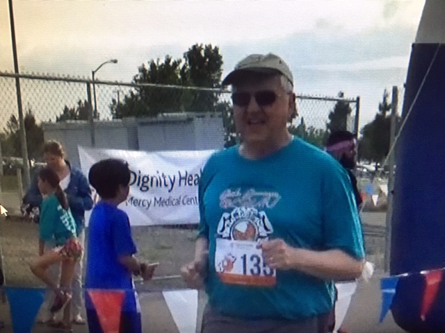  Eight months after the UC Merced 5K, another finish line.  This time, the venue was the Mercy Medical Stroke Awareness 5K.  Photo from the Newvine Personal Collection 