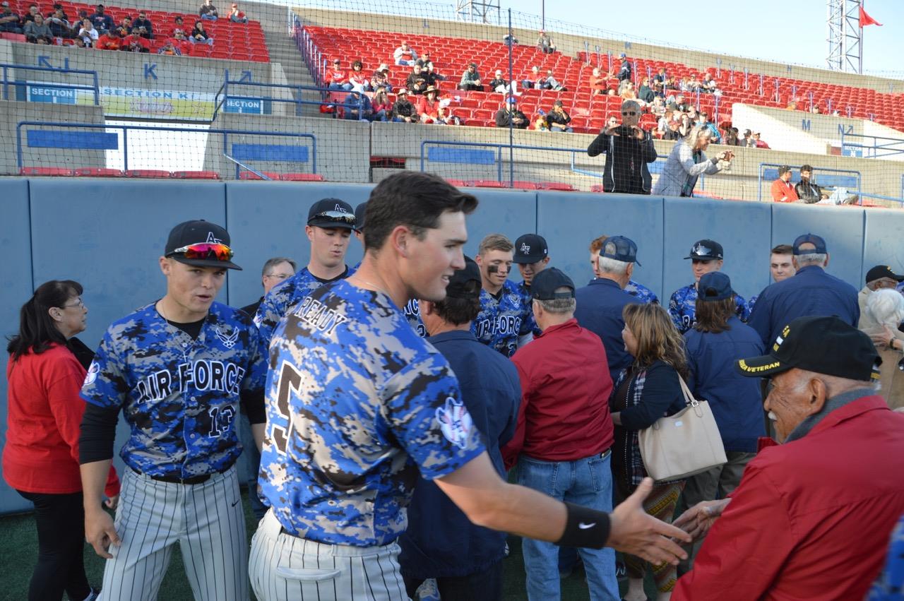  Prior to the start of the Fresno State/Air Force baseball game, players from both teams welcomed the veterans and FFA members.  Photo provided by Los Banos FFA 