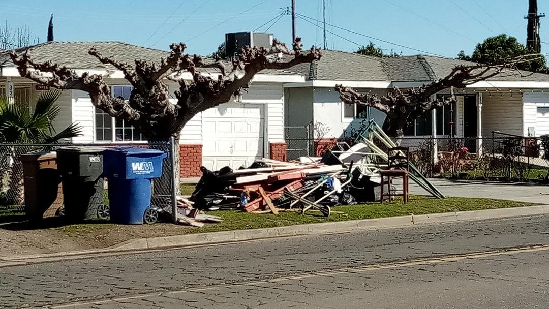  Residents in Planada are now putting water damaged furniture and building materials on the curb for pick up by County crews taking it all to a landfill.  Photo:  Steve Newvine 