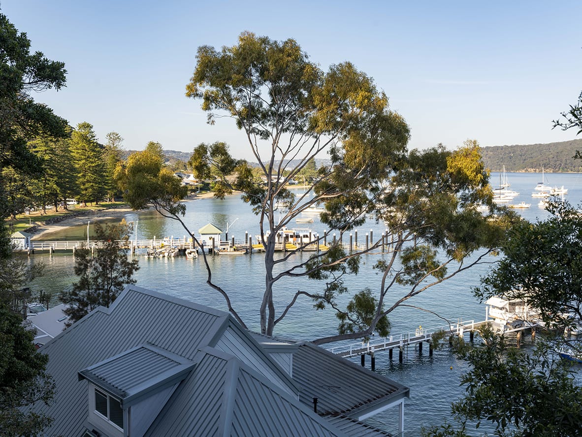 Palm Beach Wharf through the gum trees from Sandy Beach