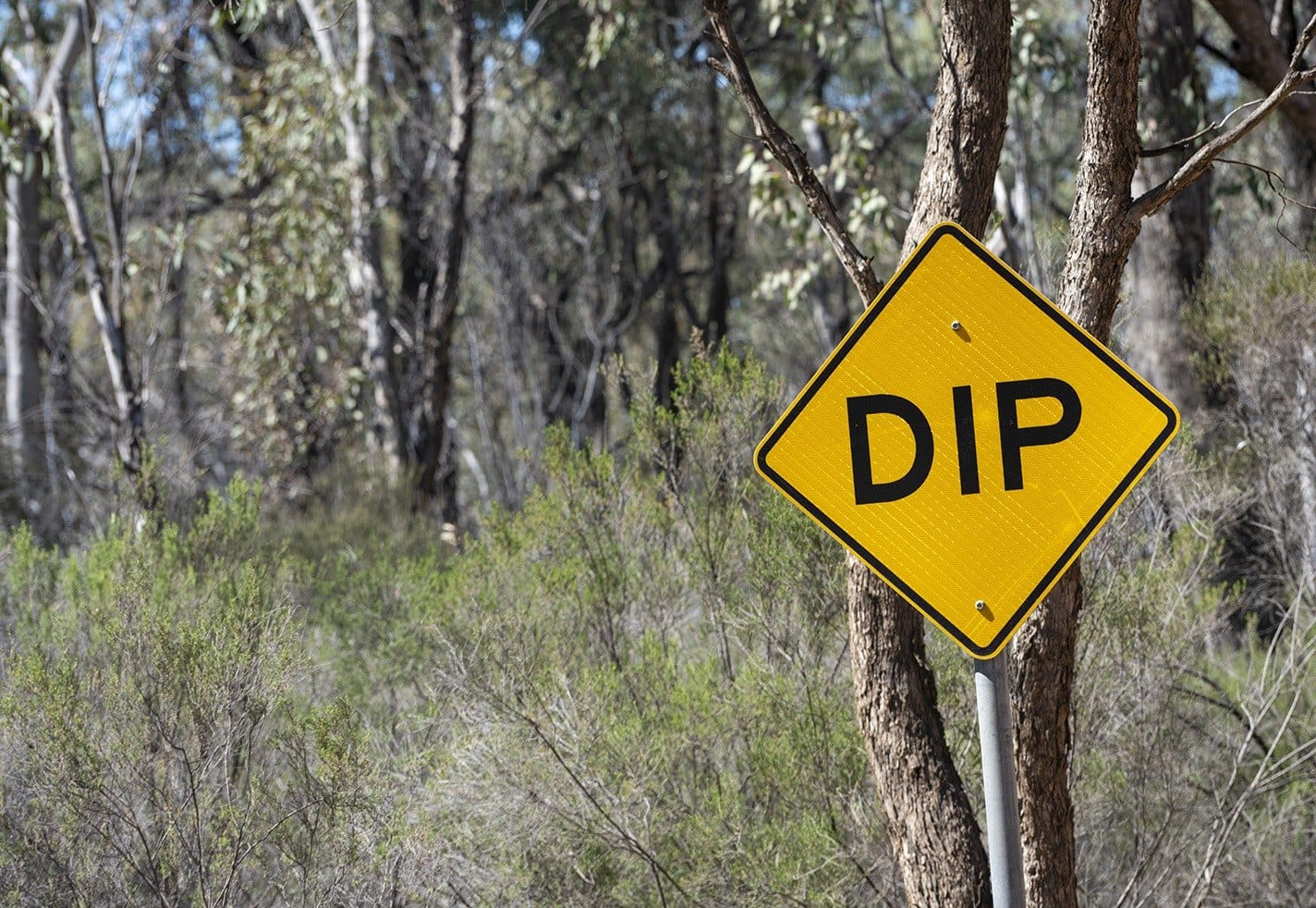 Dip ahead: a sign on the sand roads of the Pilliga