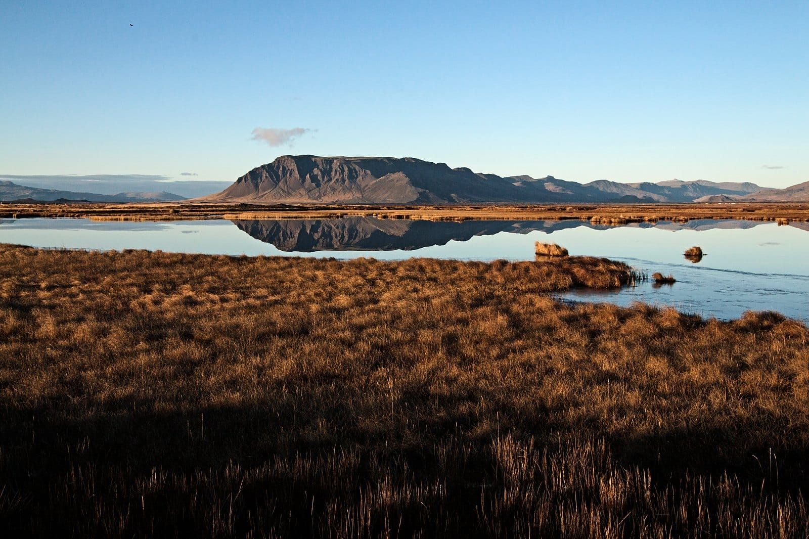 Wetland pools reflecting mountains near Borgarnes, Iceland