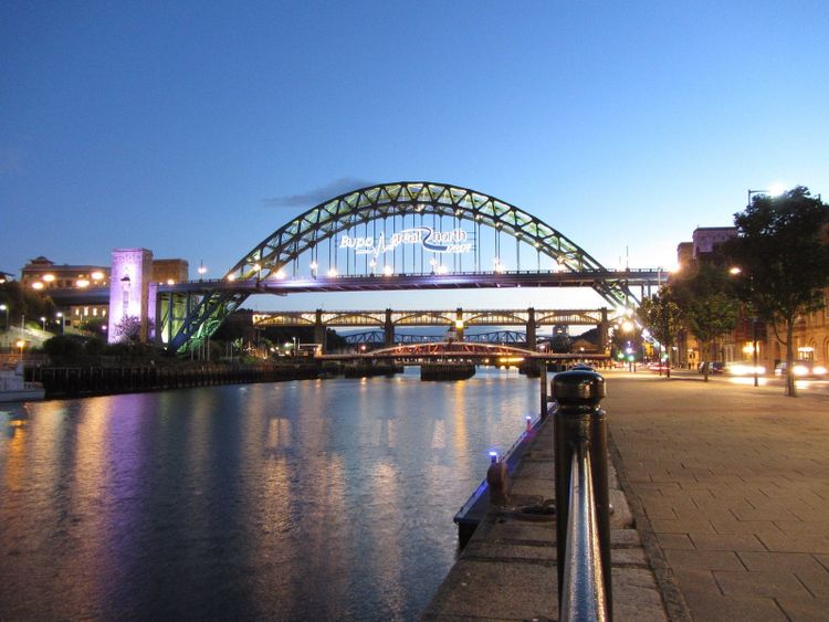 The bridges of the Tyne glowing at blue hour, Newcastle and Gateshead either side of the river