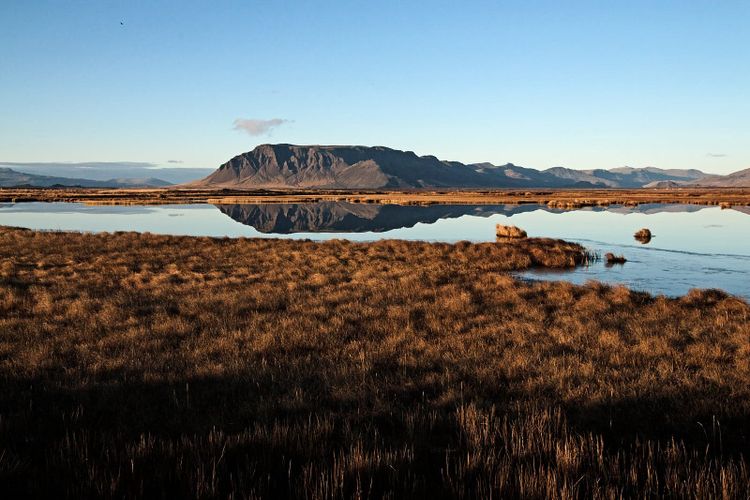 Wetland pools reflecting mountains near Borgarnes, Iceland