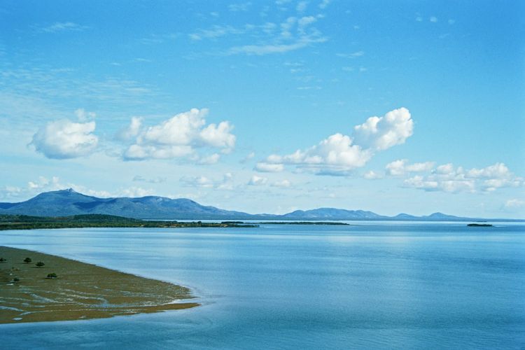 Gladstone Harbour on a clear day, with the hills behind