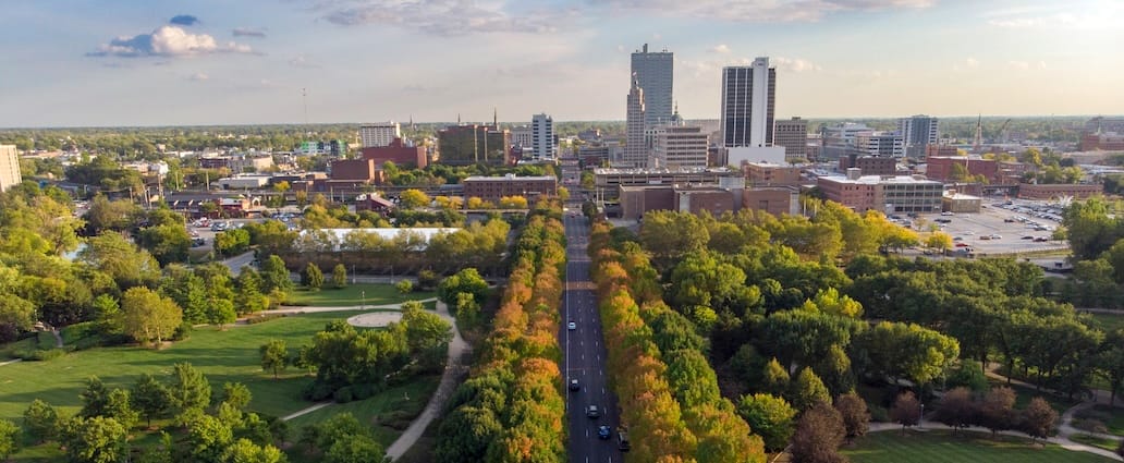 Aerial View of Main Street, Leading to Downtown Fort Wayne, Indiana. High-Rise Buildings of Downtown in the Background. 