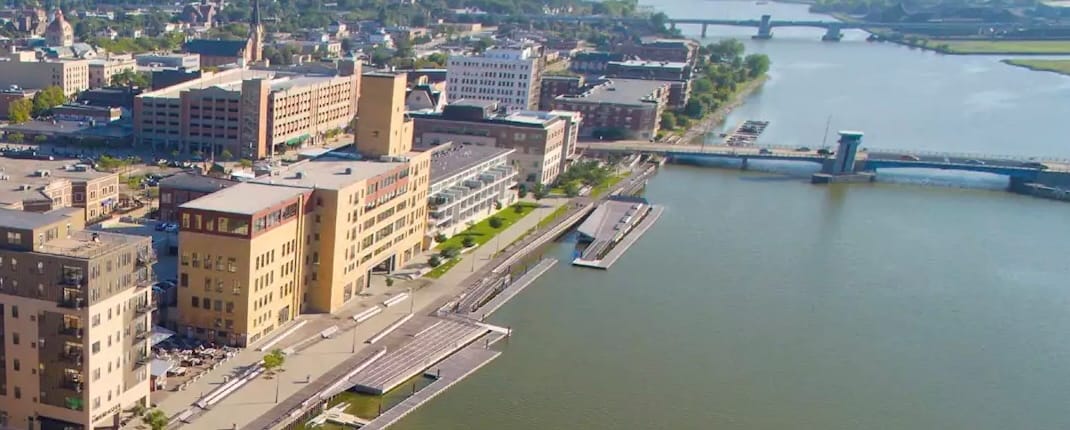 Aerial View of Green Bay Wisconsin with Fox River on the right and the downtown on the left side of the river. 