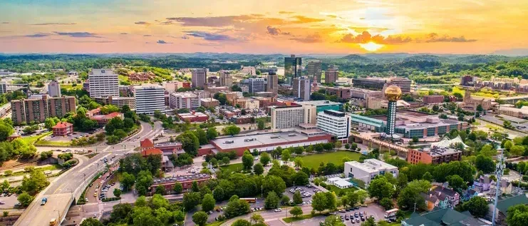Beautiful View of Knoxville at Sunset. Downtown is centered in the image and the greenery of Knoxville burbs is in the background. 