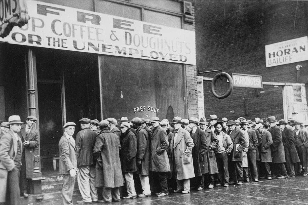 Dozens of men queue up outside an American soup kitchen