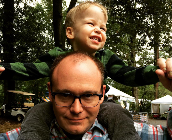 Payne with young son