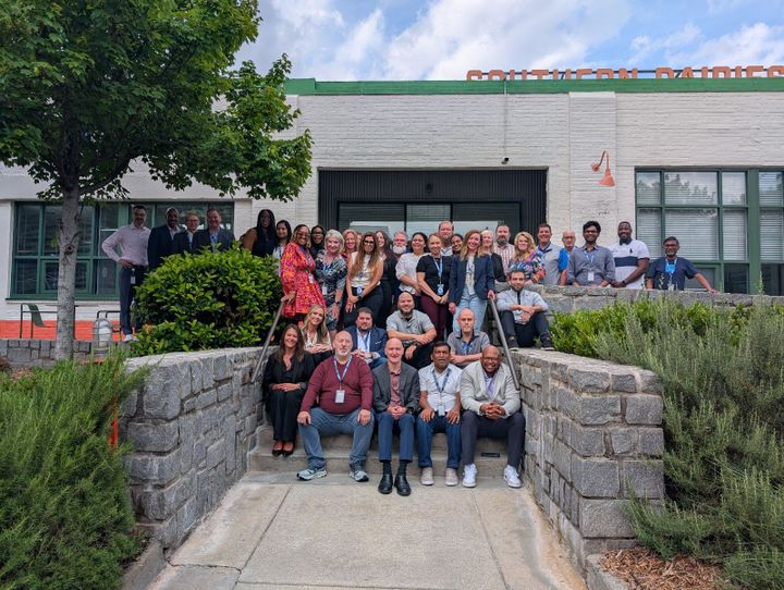 photo of Geotab's team sitting outside of the office location in Atlanta