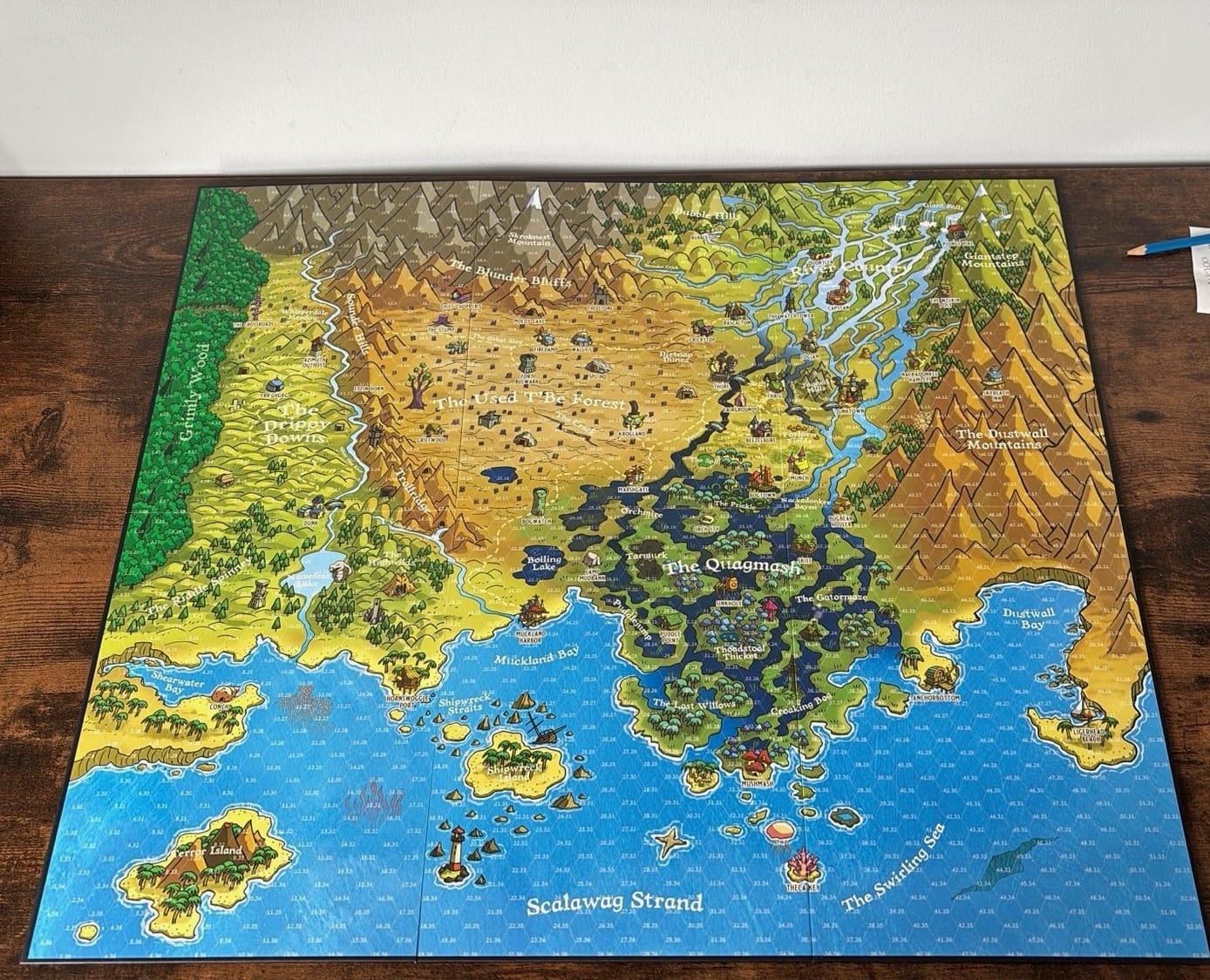 The map of the Mucklands region of Land of Eem. The south is the sea. In the west a forest, in the north and the east moutain range. The middle is a cut down forest. Between the previously-a-forest area and the mountain range in the east, a really concentrated area of rivers, and a swamp