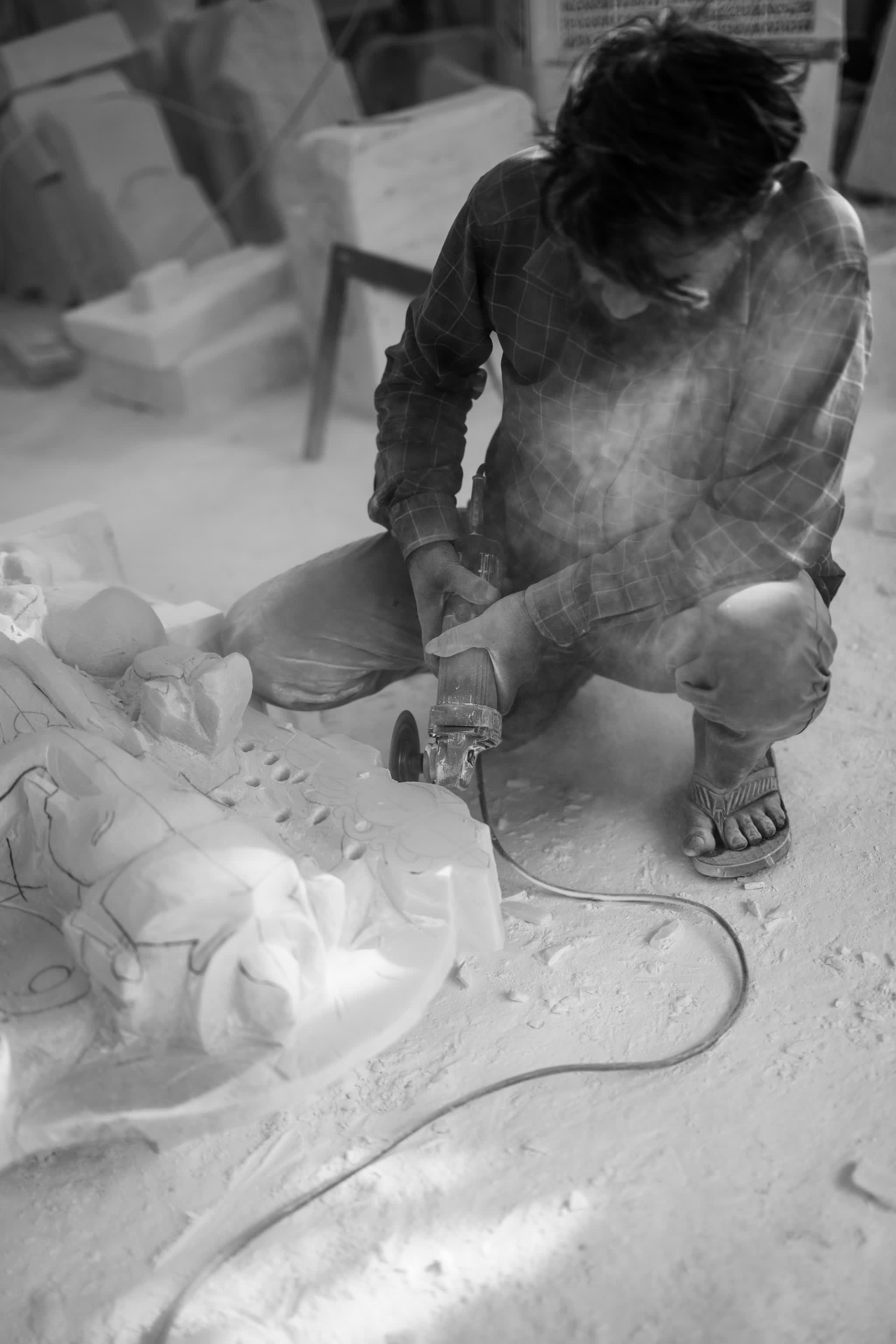 The marble sculptor mid-work