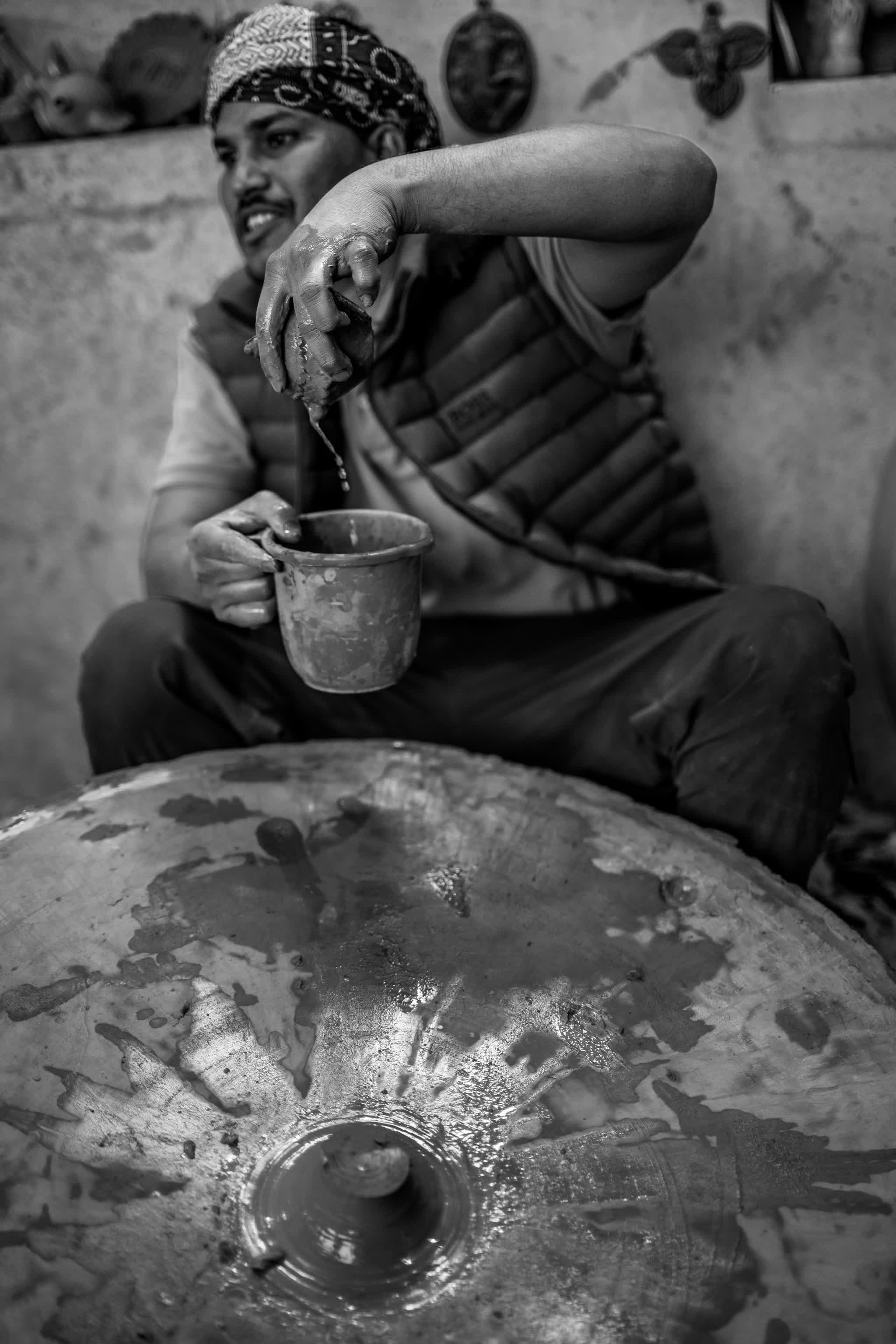 Portrait of a potter at his wheel