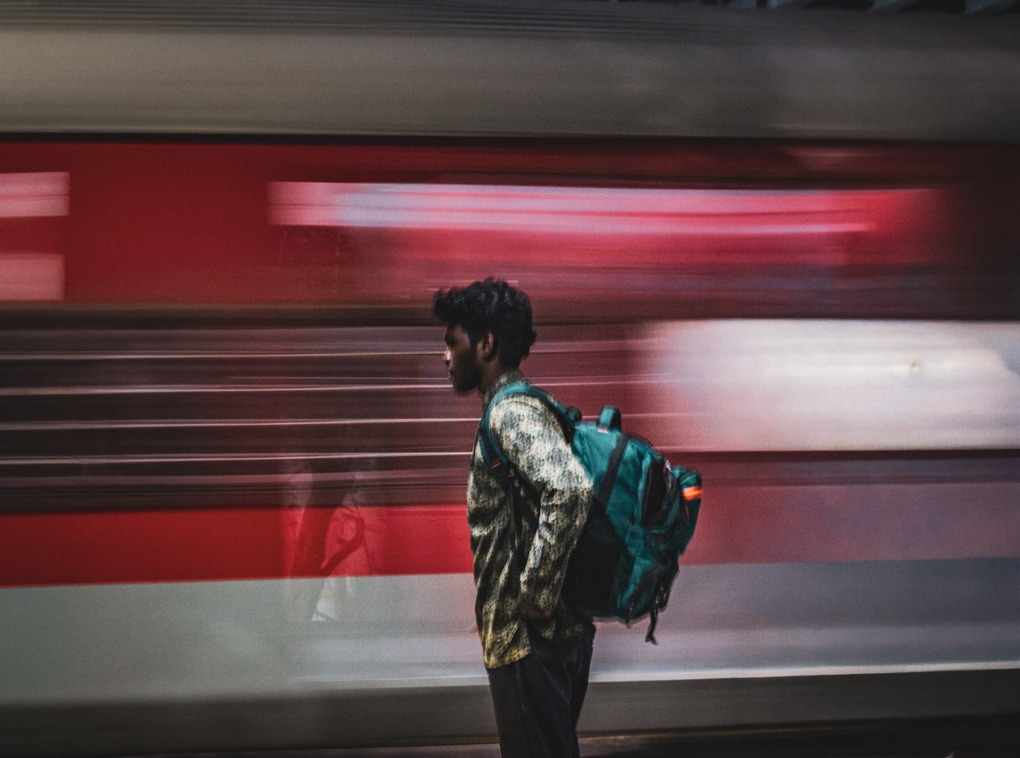 Photograph by Shreesh — 'Hope', a figure still amid the rush of a railway platform
