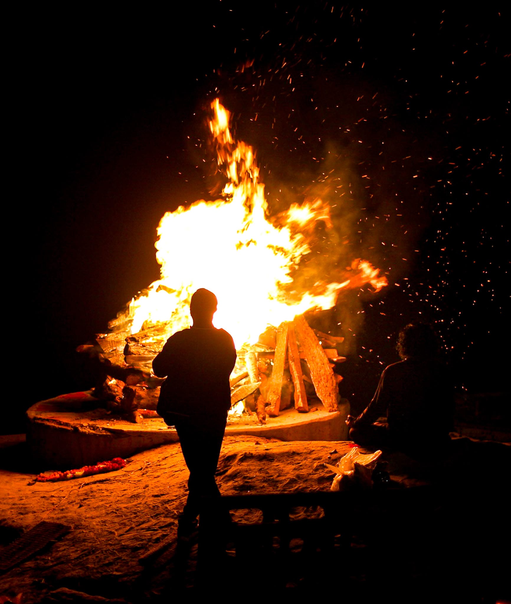 Photograph by Shreesh — near the fire at Manikarnika