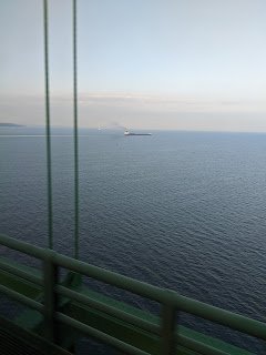  Big Great Lakes Freighter chugging away while crossing. 