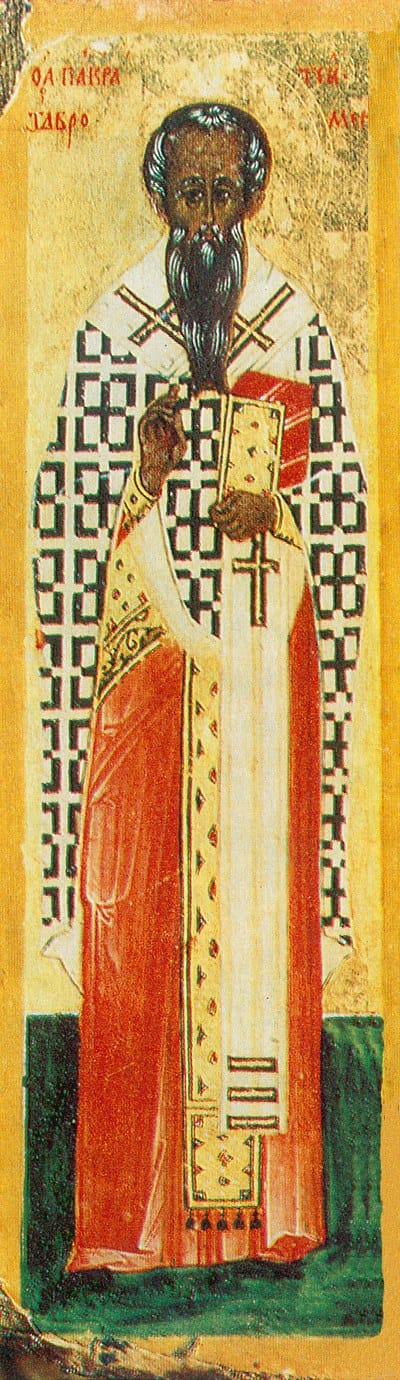 The traditional icon of Saint Pancratius of Taormina: full-length, vested as a bishop in a cross-covered robe, holding the Gospel, right hand raised in blessing