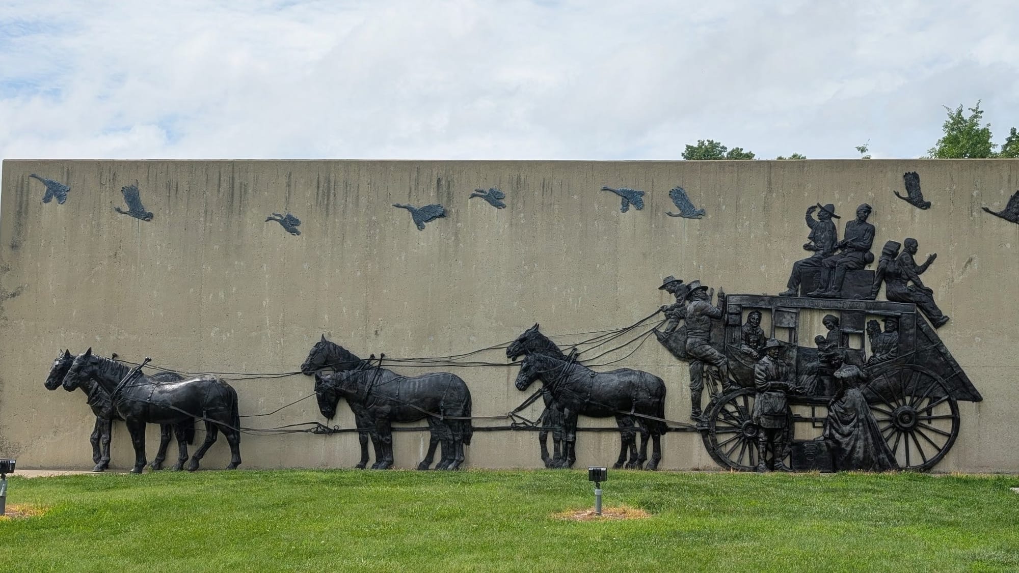 A monument to a Santa Fe Trail wagon train, on the American Discovery Trail in Kansas