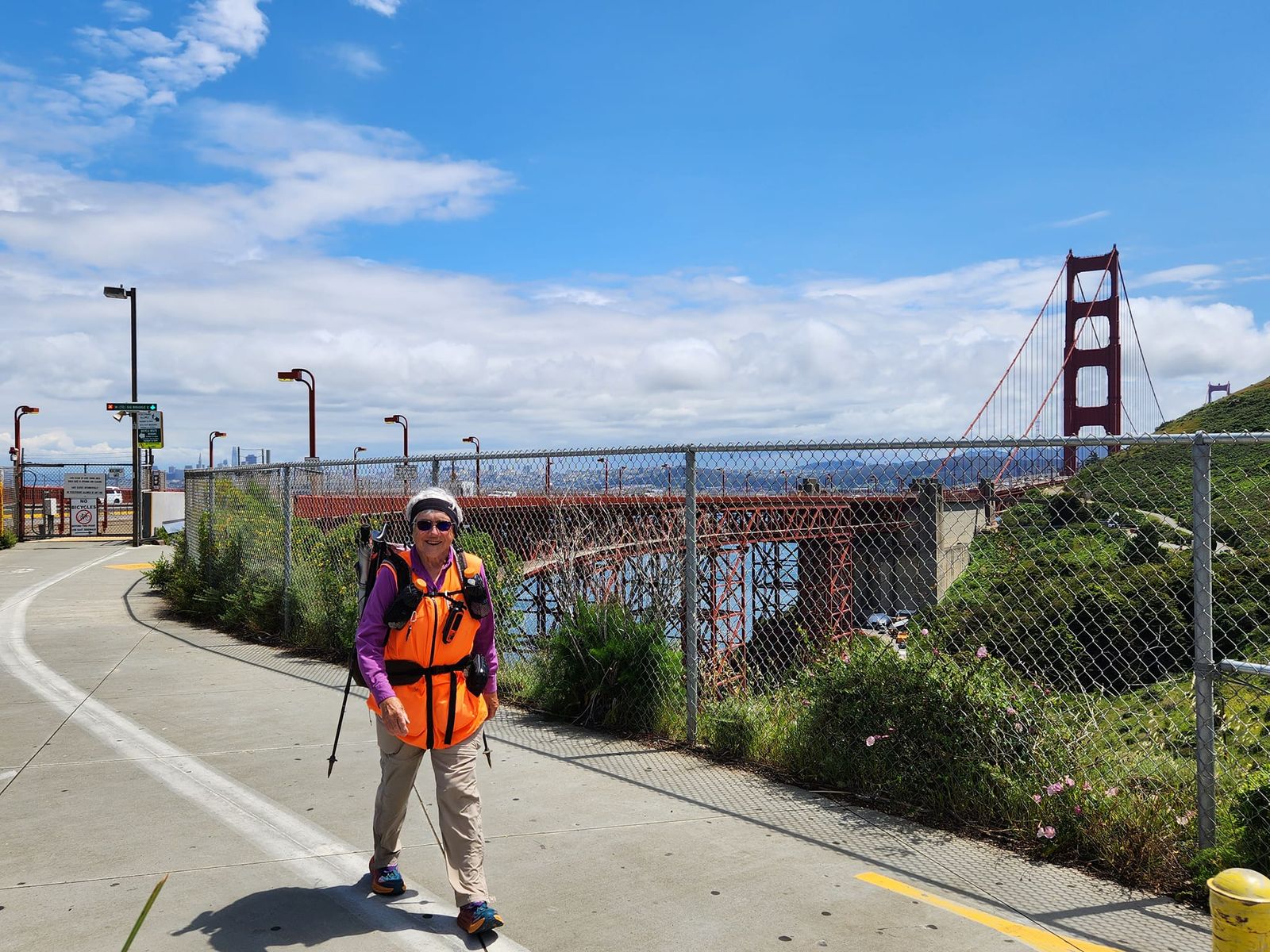 Hiker Mary Davison crossing the Golden Gate Bridge on the American Discovery Trail