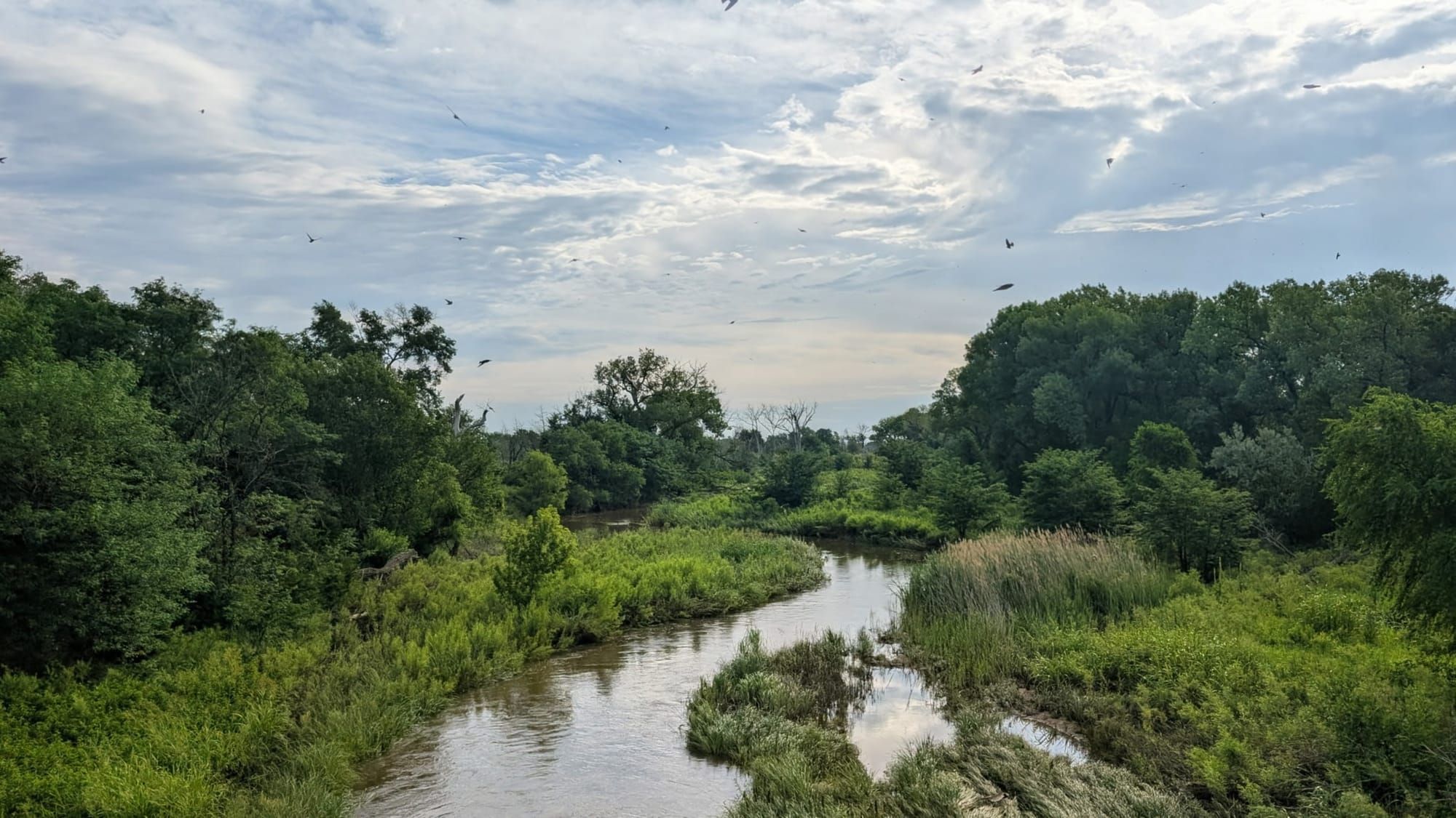 A river flows along River Road in the Kansas Prairie