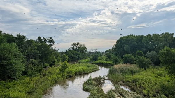 A river flows along River Road in the Kansas Prairie
