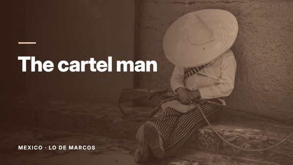 A person in a wide straw hat sitting against an ochre wall, face hidden. Text: “The cartel man”, Mexico: Lo de Marcos.